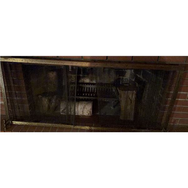 Brick Fireplace With Metal Mesh Screen and Accessories