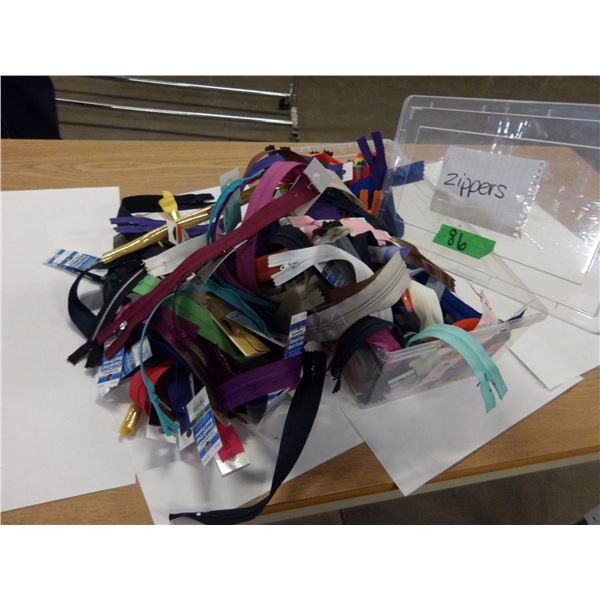 UNCLAIMED STORAGE:  TOTE C/W ASSORTED ZIPPERS?
