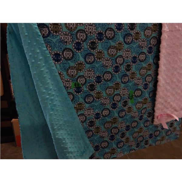 UNCLAIMED STORAGE:  2 NEW SINGLE QUILTS