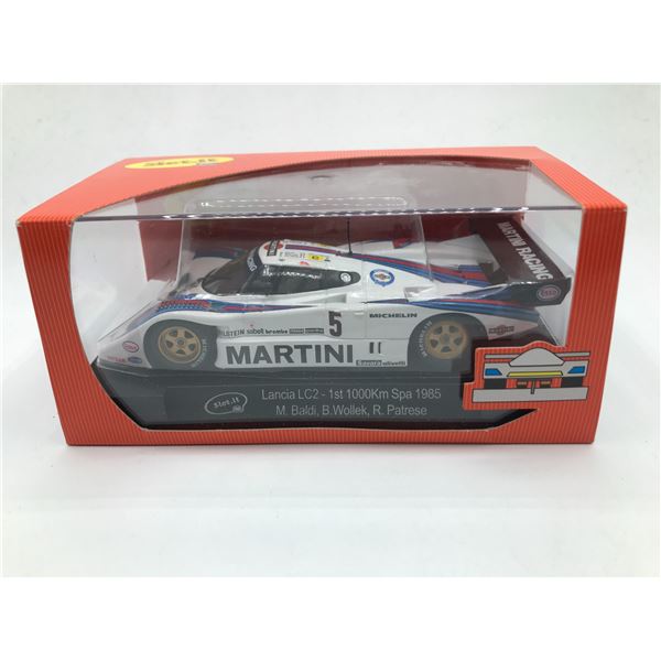 LANCIA LC2 1ST 1000KM SPA M.BALDI, B.WOLLEK, R.PATRESE IN ORIGINAL PACKAGING