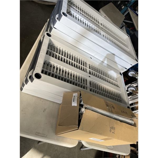 PLASTIC SHELVING UNIT - 11 SHELVES AND BOX OF POLES