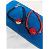 Image 1 : 2 BRACELETS, POKEMON AND RED CINNEBAR