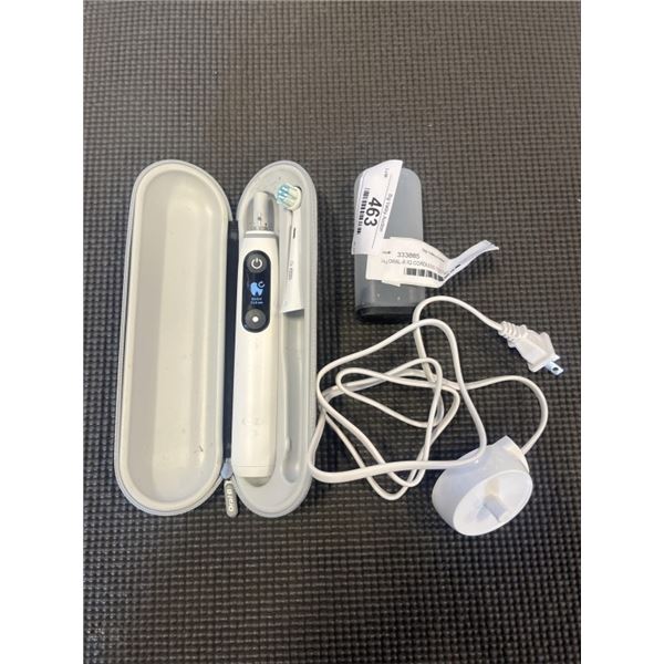ORAL-B IQ CORDLESS TOOTHBRUSH WITH CHARGER AND CASE WORKING