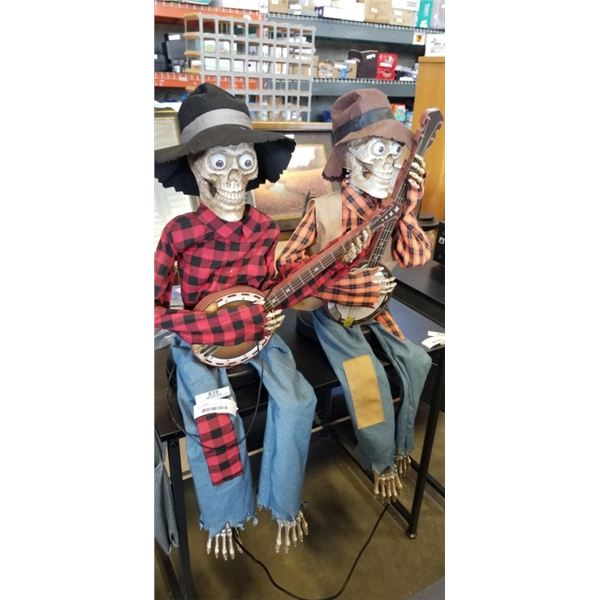 2 SINGING BANJO PLAYING SKELETON. WORKING