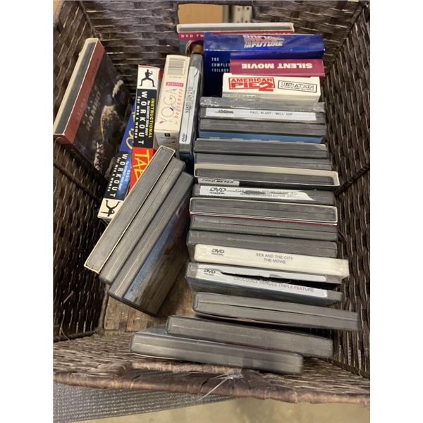 BASKET OF DVDS AND TRAY OF HOUSEHOLD DECOR