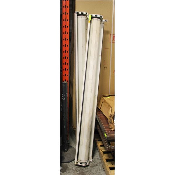 TWO 72" WHITE ROLLING SECURITY GATES