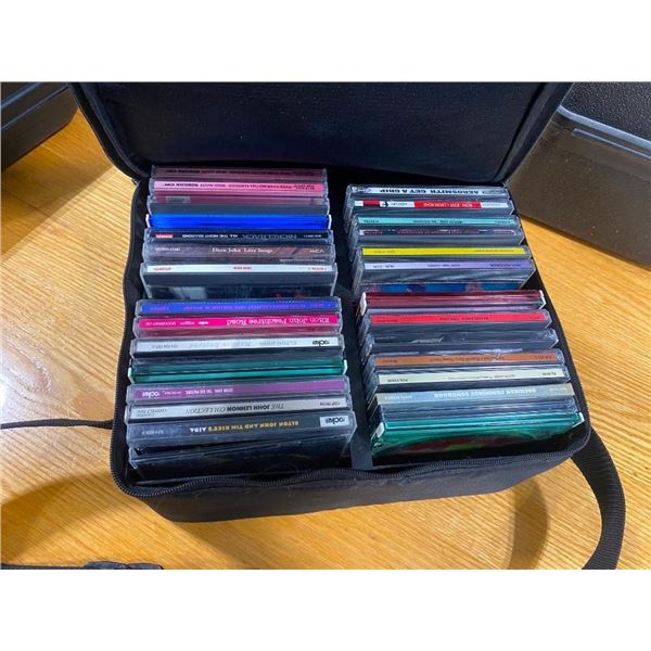 ASSORTED CDS WITH CARRYING CASE