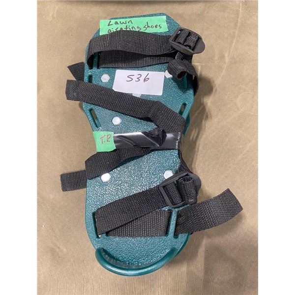 PAIR OF LAWN AERATING STRAP-ON SHOES