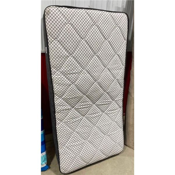 TWIN SIZE SEALY MATTRESS - HAS SMALL DIRT MARK - OUT OF BAG NOT USED