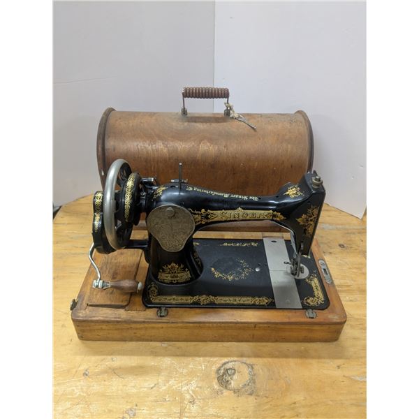Antique (1910) Singer Class 28 handcrank sewing machine, complete with original coffin style carry/s