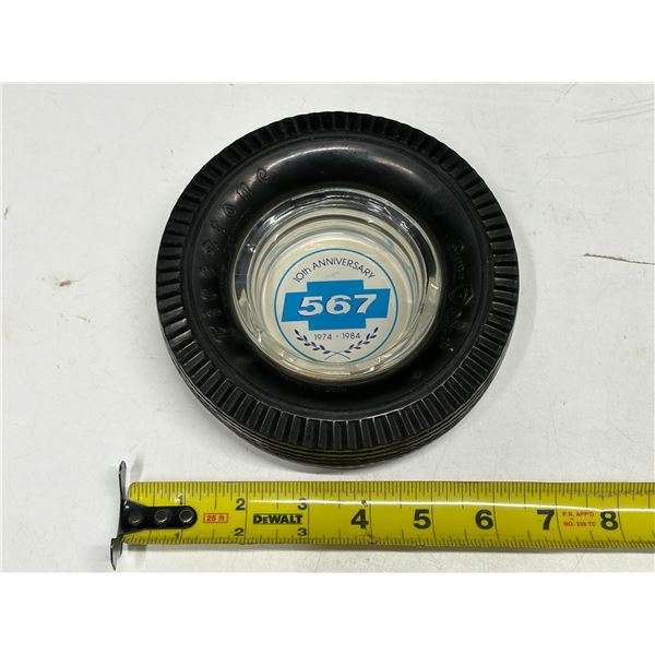 Vintage Firestone tire and glass ashtray commemorating the 10th Anniversary (1974–1984).