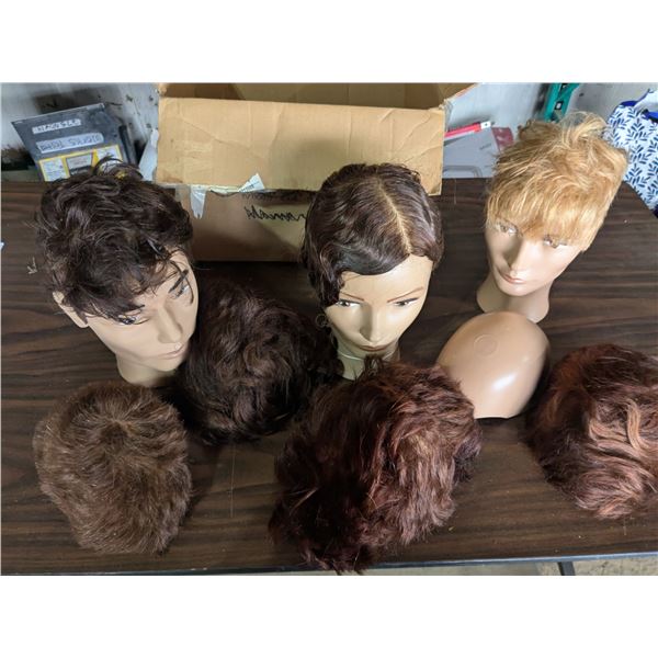 3 mannequin heads with 5 extra hairpieces