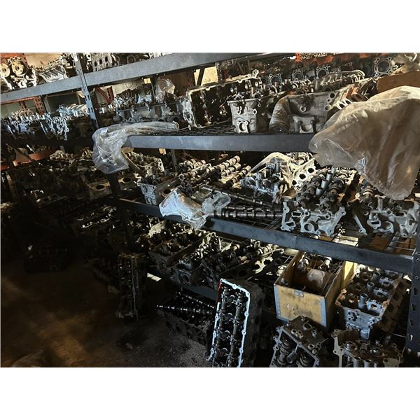 Large Lot Cylinder Heads on Black Double Rack - 65