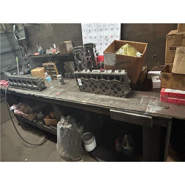 Cylinder Heads Parts on Work Bench