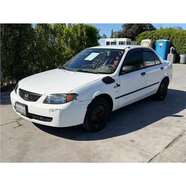 MAZD PROTEGE 2002 T-DON - SMOG