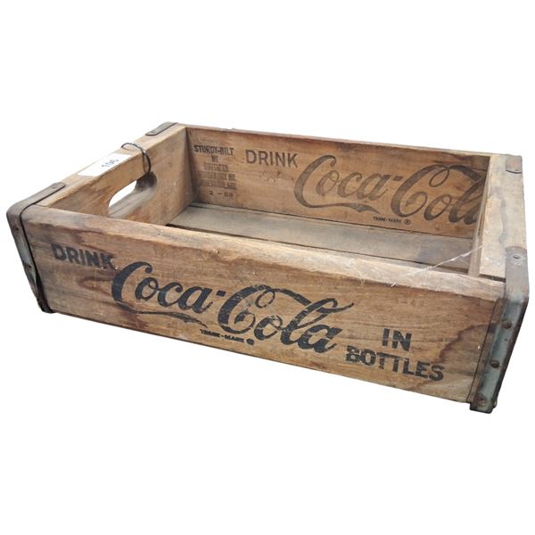 Vintage wooden Coca-Cola crate with metal brackets