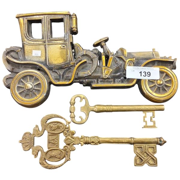 3 ornate brass decorations, largest is 15"