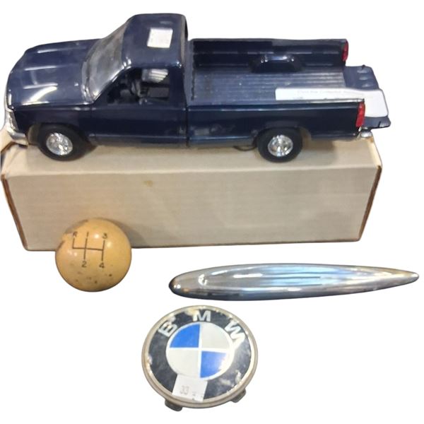 Vintage automotive collectible lot inc dealer promo car, emblems and shifter knob
