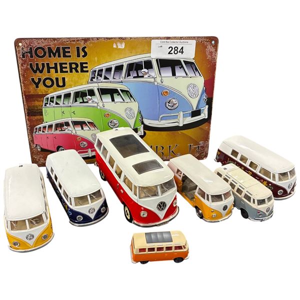 7 die cast Volkswagen vans, largest 6" & tin sign