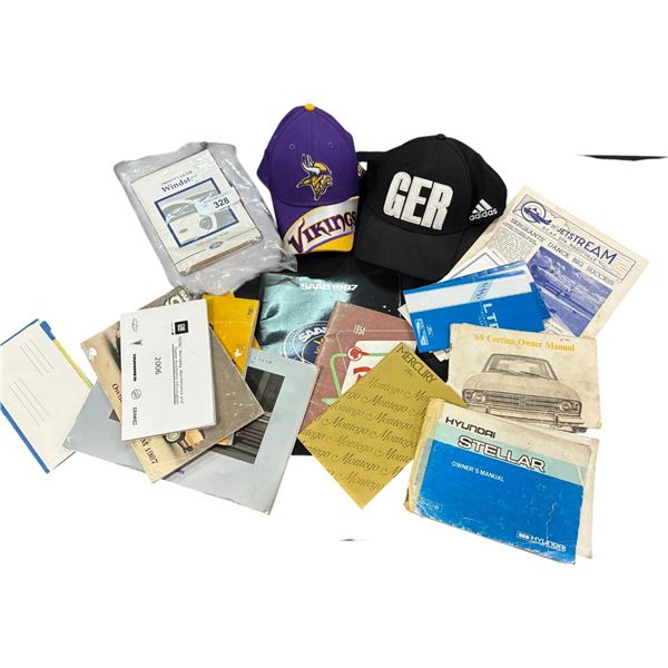 Collection of vintage car manuals & 2 trucker hats