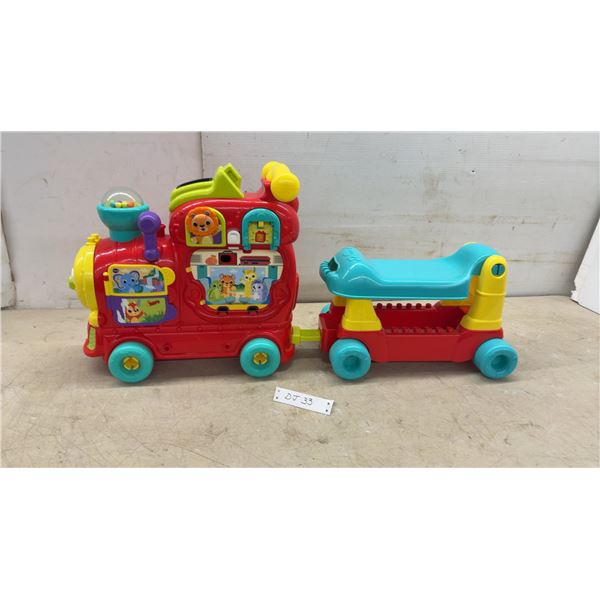VTech Sit-to-Stand Ultimate Alphabet Train Ride-On Toy and Activity Center and 11 Thomas the Train