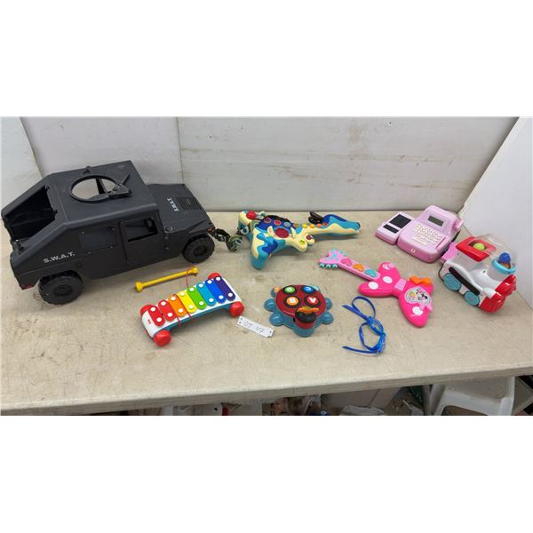 S.W.A.T. Humvee Toy Vehicle, Xylophone, Battery Operated Toy Guitars, Cash Register, Ladybug Toy