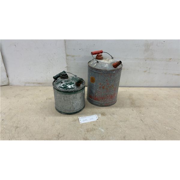 Two Vintage Galvanized Metal Fuel Cans with Wire Bail Handles and Wooden Grips
