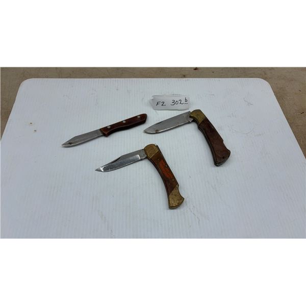 Two Folding Knives and Fixed Blade Knife