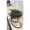 Image 2 : Coiled Length of Black Three-Conductor Electrical Mains Power Cable with Stripped Ends