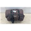 Image 1 : Brown Rolled Sleeping Bag with Compression Straps