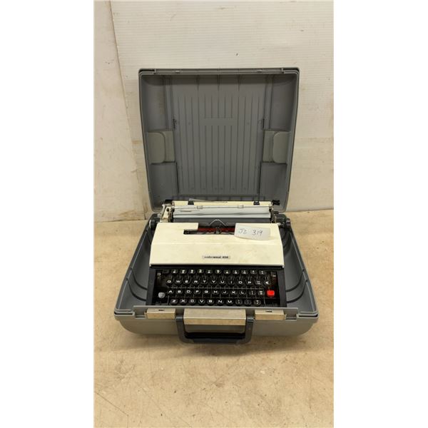Underwood 450 Portable Mechanical Typewriter with QWERTY Keyboard and Gray Carrying Case