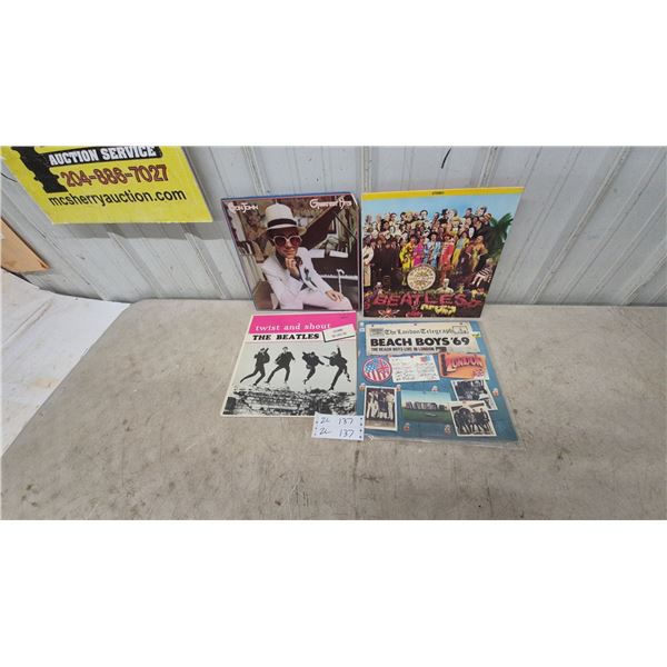 4 Vinyl Records: Elton John, Beatles Sgt, Pepper's, Beatles Twist and Shout and Beach Boys