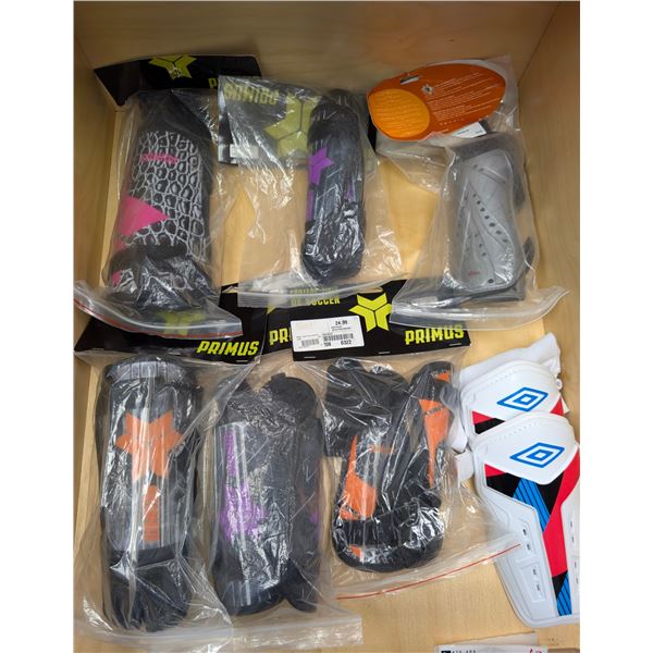 LOT OF 7 ASSORTED SOCCER SHIN-GUARDS