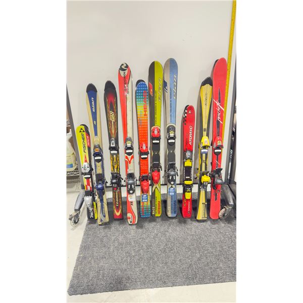 LOT OF 10 **USED** ASSORTED ALPINE SKIS WITH BINDINGS