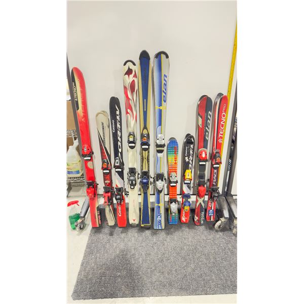 LOT OF 10 **USED** ASSORTED ALPINE SKIS WITH BINDINGS