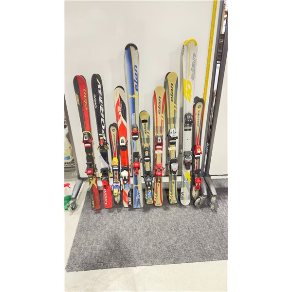 LOT OF 10 **USED** ASSORTED ALPINE SKIS WITH BINDINGS