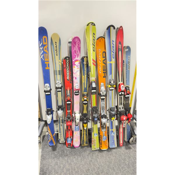 LOT OF 10 **USED** ASSORTED ALPINE SKIS WITH BINDINGS