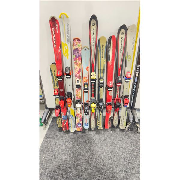 LOT OF 10 **USED** ASSORTED ALPINE SKIS WITH BINDINGS
