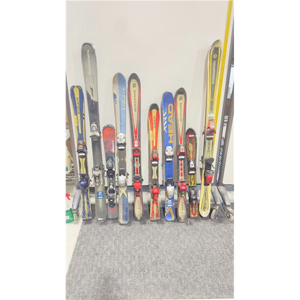 LOT OF 10 **USED** ASSORTED ALPINE SKIS WITH BINDINGS