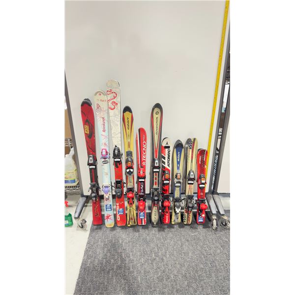 LOT OF 10 **USED** ASSORTED ALPINE SKIS WITH BINDINGS