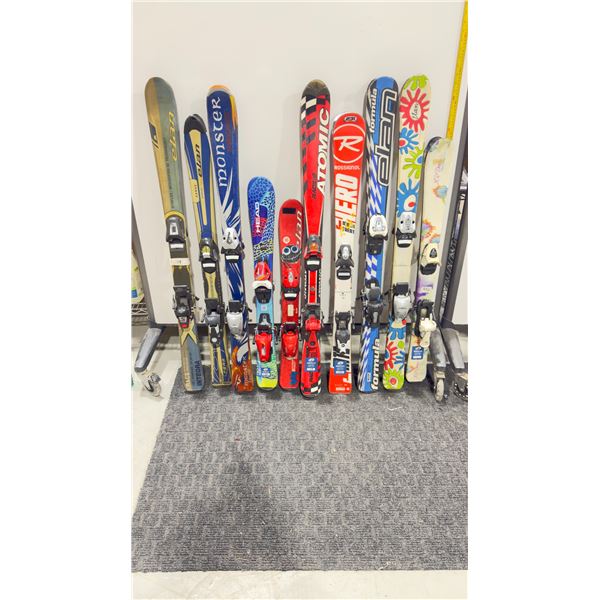LOT OF 10 **USED** ASSORTED ALPINE SKIS WITH BINDINGS