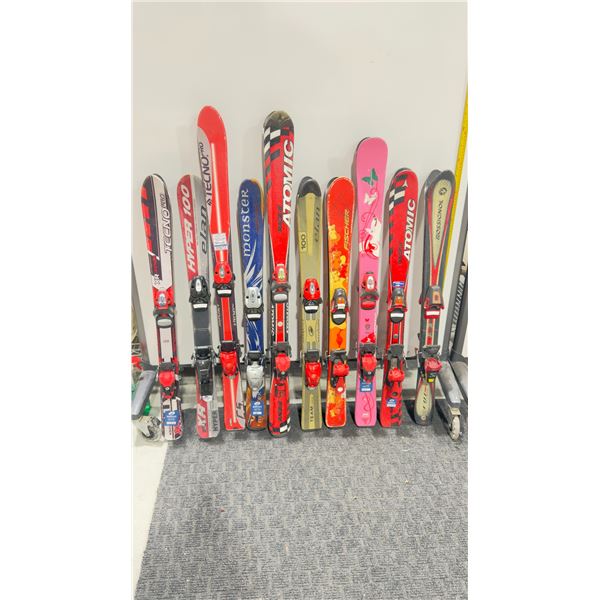 LOT OF 10 **USED** ASSORTED ALPINE SKIS WITH BINDINGS