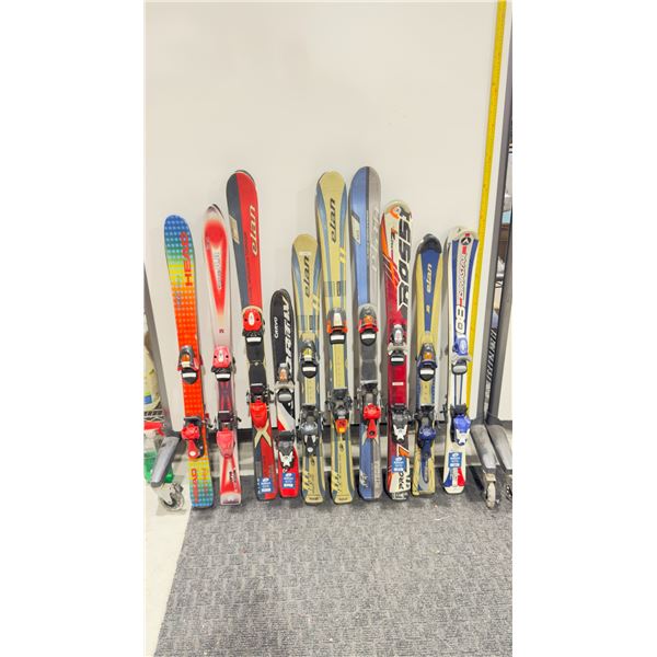 LOT OF 10 **USED** ASSORTED ALPINE SKIS WITH BINDINGS