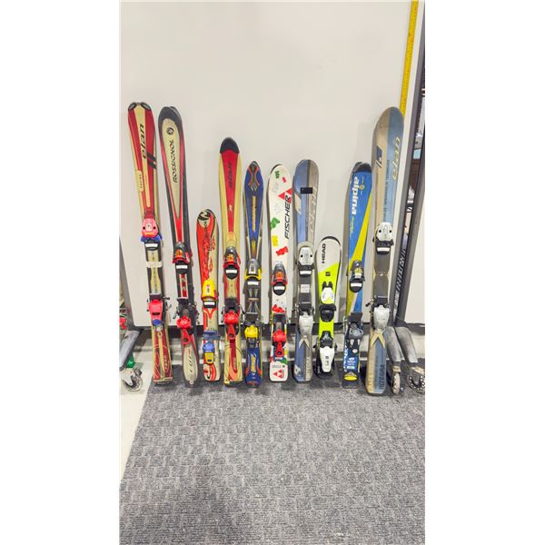 LOT OF 10 **USED** ASSORTED ALPINE SKIS WITH BINDINGS