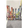 Image 1 : LOT OF 10 **USED** ASSORTED ALPINE SKIS WITH BINDINGS