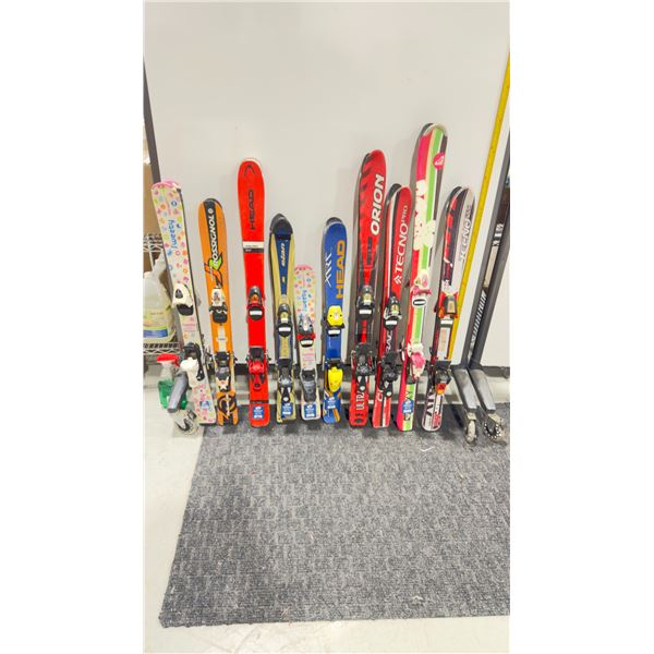 LOT OF 10 **USED** ASSORTED ALPINE SKIS WITH BINDINGS
