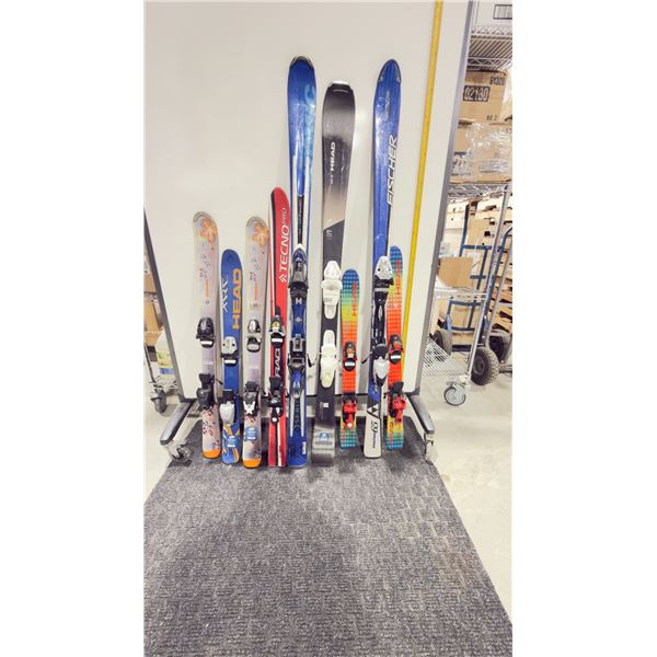 LOT OF 9 **USED**SINGLE SKIS FOR DECORATION