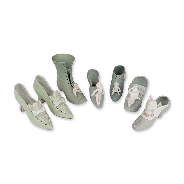 Group of Mixed Glazed and Bisque Ceramic Shoe Figurines