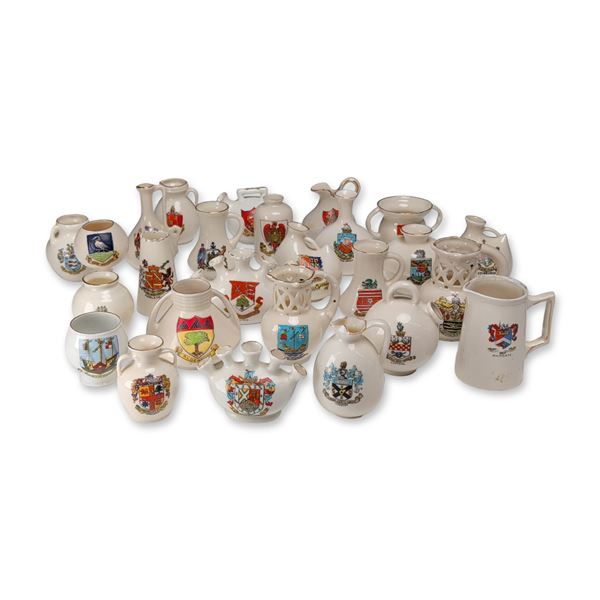 A Collection of British Crested Porcelain Miniature Souvenir Vessels