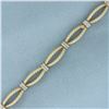 Image 2 : Designer Diamond Rope Design Bracelet in 14k Yellow gold